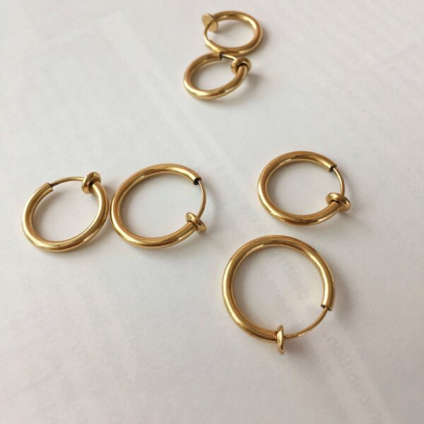 Gold_Retractable_hoops_in_3_sizes_-_perfect_for_creating_a_layered_hoop_earring_stack_-_The_Hexad_1800x1800_be416dbd-4bd9-482f-ac56-da2b850f76b7